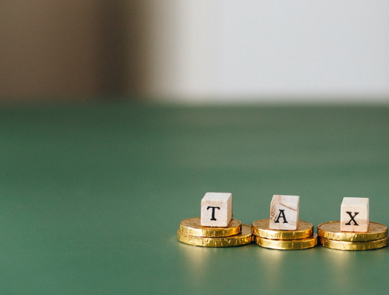 Some letter cubes spelling Tax.